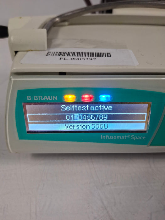 B. Braun Infusomat Space w/Pole Clamp & AC Adapter Infusion Pump