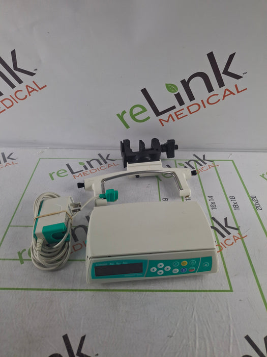 B. Braun Infusomat Space w/Pole Clamp & AC Adapter Infusion Pump