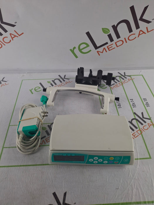 B. Braun Infusomat Space w/Pole Clamp & AC Adapter Infusion Pump