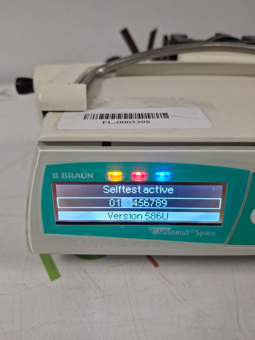 B. Braun Infusomat Space w/Pole Clamp & AC Adapter Infusion Pump