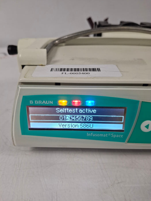 B. Braun Infusomat Space w/Pole Clamp & AC Adapter Infusion Pump