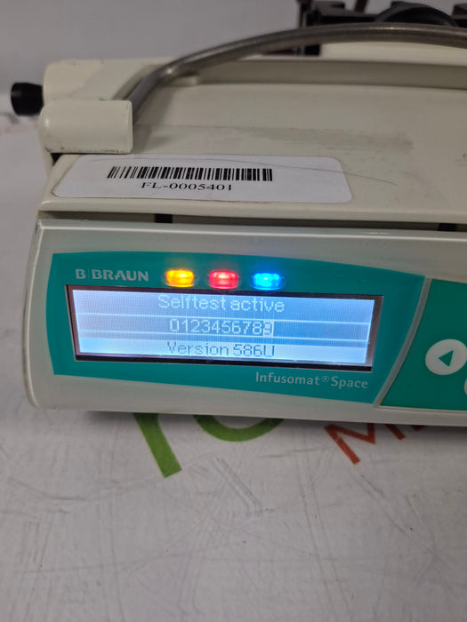 B. Braun Infusomat Space w/Pole Clamp & AC Adapter Infusion Pump