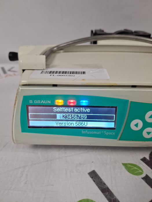 B. Braun Infusomat Space w/Pole Clamp & AC Adapter Infusion Pump