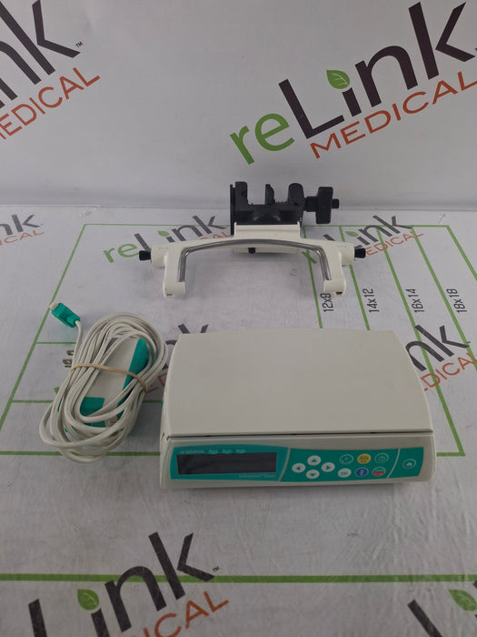 B. Braun Infusomat Space w/Pole Clamp & AC Adapter Infusion Pump
