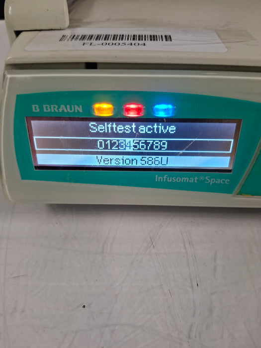 B. Braun Infusomat Space w/Pole Clamp & AC Adapter Infusion Pump