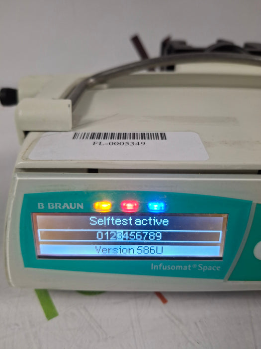 B. Braun Infusomat Space w/Pole Clamp & AC Adapter Infusion Pump