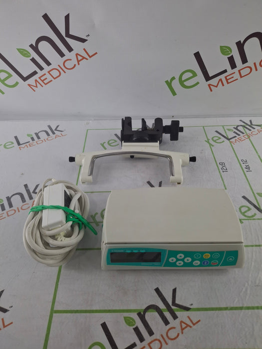 B. Braun Infusomat Space w/Pole Clamp & AC Adapter Infusion Pump