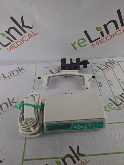 B. Braun Infusomat Space w/Pole Clamp & AC Adapter Infusion Pump