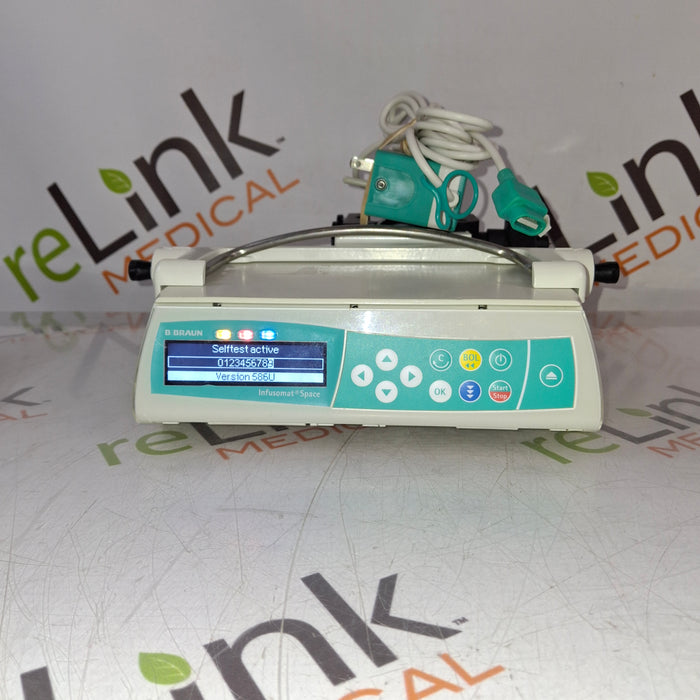B. Braun Infusomat Space w/Pole Clamp & AC Adapter Infusion Pump