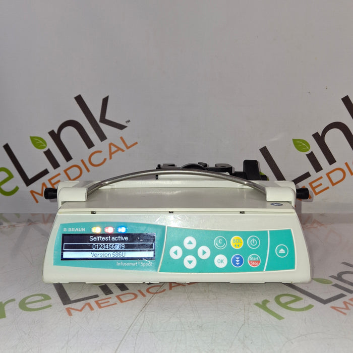B. Braun Infusomat Space w/Pole Clamp & AC Adapter Infusion Pump