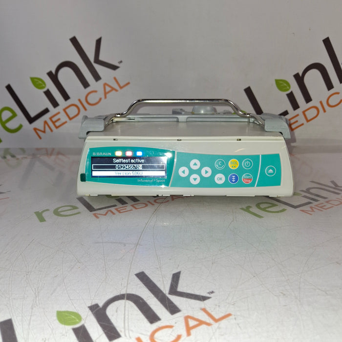 B. Braun Infusomat Space w/Pole Clamp & AC Adapter Infusion Pump