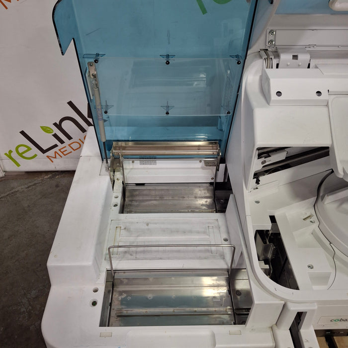 Roche Diagnostics e 411 Immunoassay Analyzer